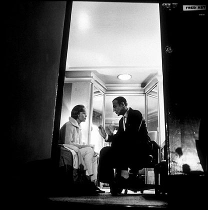 Debbie Reynolds and Fred Astaire in his dressing room during a break from filming 