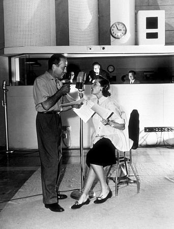 Humphrey Bogart and Lauren Bacall at a radio station, 1952.