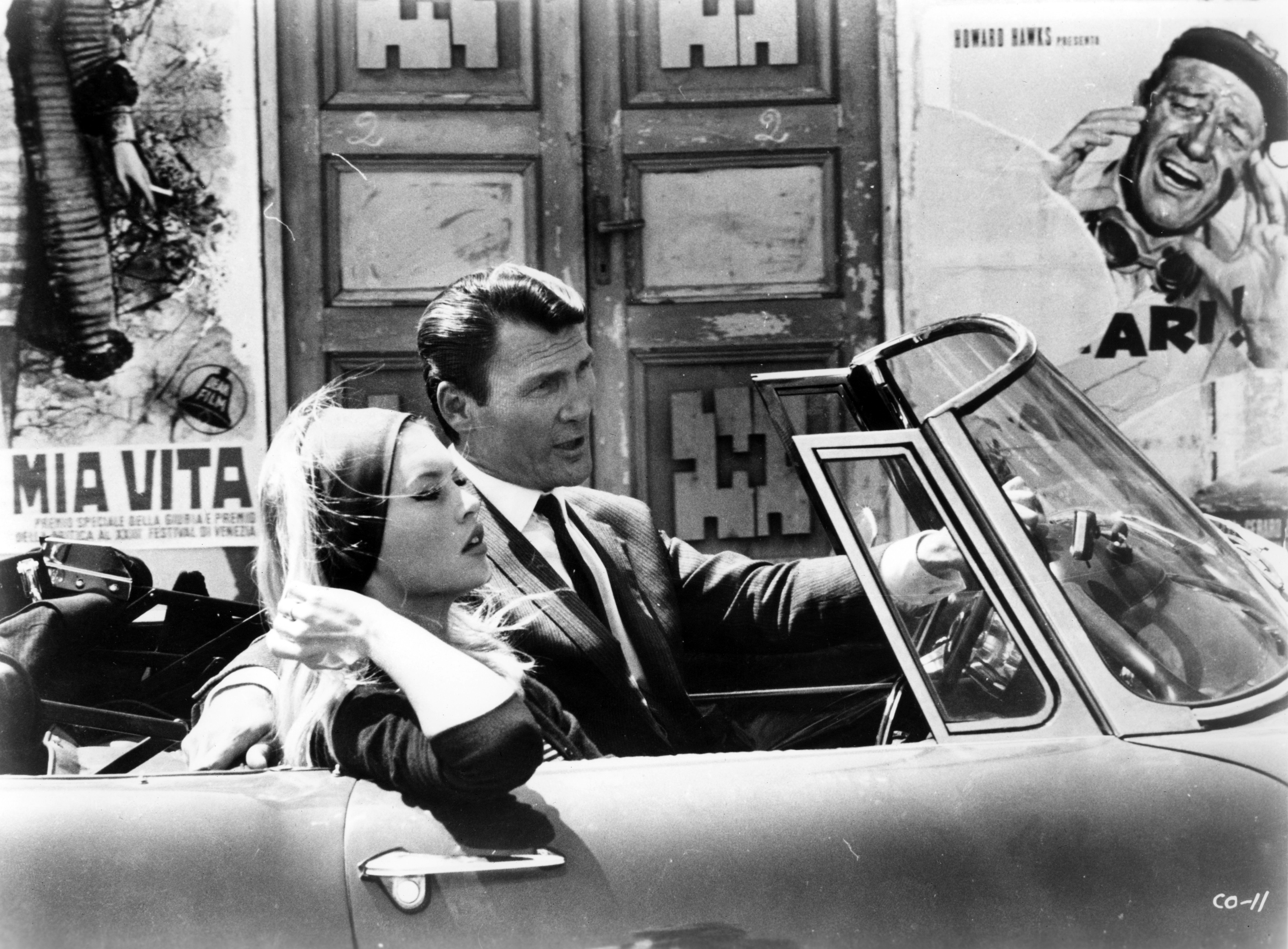 Still of Brigitte Bardot, Jean-Luc Godard and Jack Palance in Le mépris (1963)