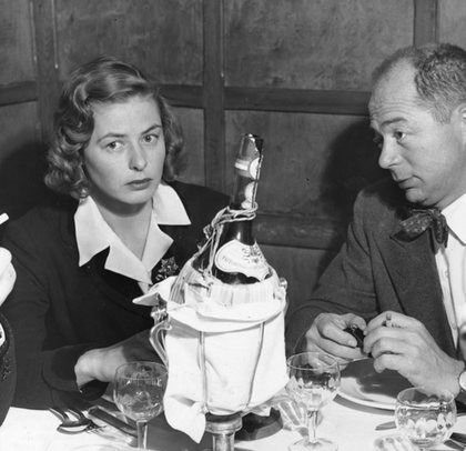 Ingrid Bergman and director Billy Wilder at a restaurant in Rome