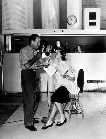 Humphrey Bogart and Lauren Bacall at a radio station, 1952.