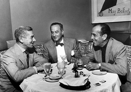 Humphrey Bogart and Mike Romanoff at Romanoff's in Beverly Hills, CA, 1952.