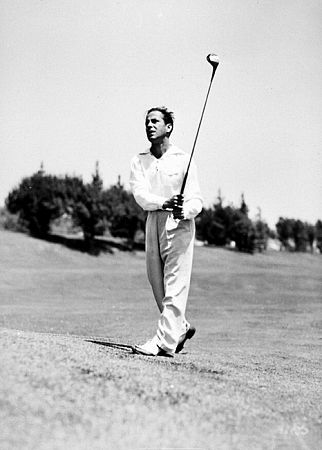 Playing golf, circa 1949.