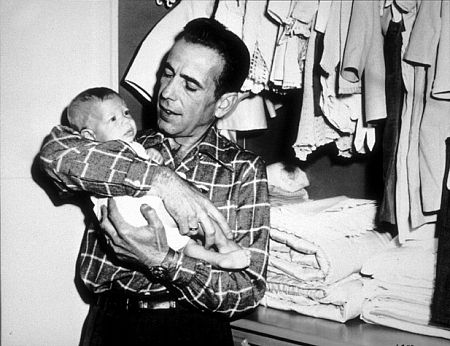Humphrey Bogart and his son, Stephen, at home, 1949.