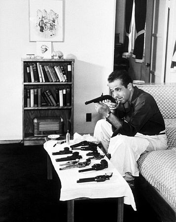 With his gun collection at home, circa 1946.