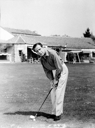 Playing golf at a Beverly Hills country club, circa 1942.