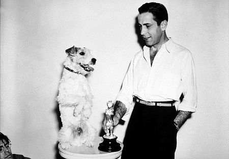 With his dog and a dog award, circa 1934.