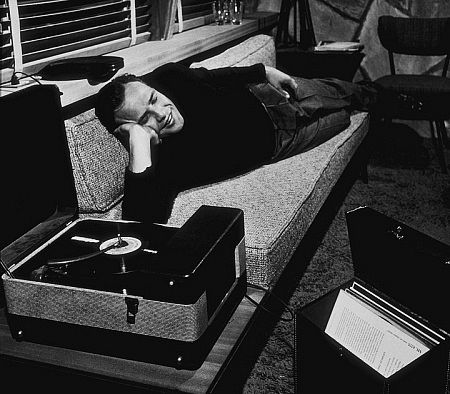 Marlon Brando listening to records at home