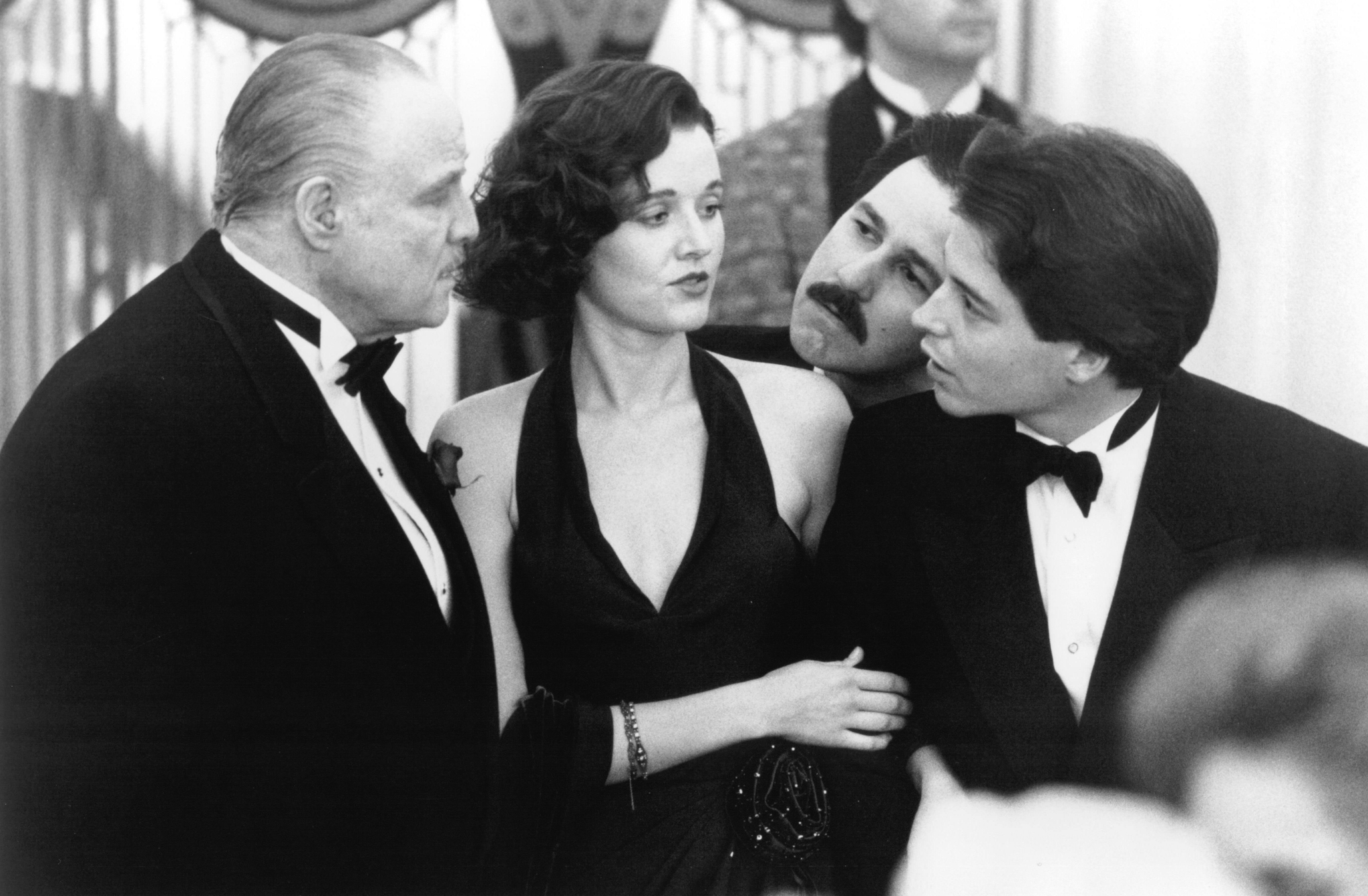 Still of Marlon Brando, Matthew Broderick, Penelope Ann Miller and Bruno Kirby in The Freshman (1990)