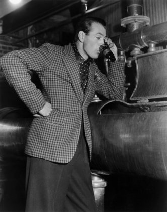 Gary Cooper testing the first batch of real honest-to-goodness beer to come through the vats at the Los Angeles Brewing Company circa 1935