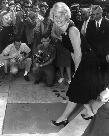 Doris Day At her footprint ceremony at The Mann Chinese Theater in Hollywood, California. January 19,1961