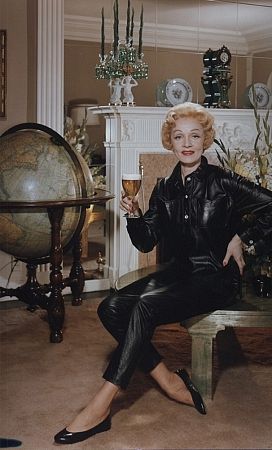 Marlene Dietrich posing for a Rheingold beer advertisement, circa 1950. Modern color, 14x11. $800 © 1978 Paul Hesse MPTV