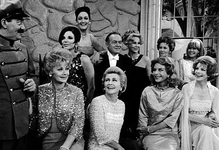 Bob Hope with Jerry Colonna and all of his leading ladies: left to right- (Back row) Joan Collins, Dorothy Lamour, Virginia Mayo, Vera Miles, Janis Paige (front row) Lucille Ball, Joan Fontaine, Hedy Lamarr and Signe Hasso, circa 1961.