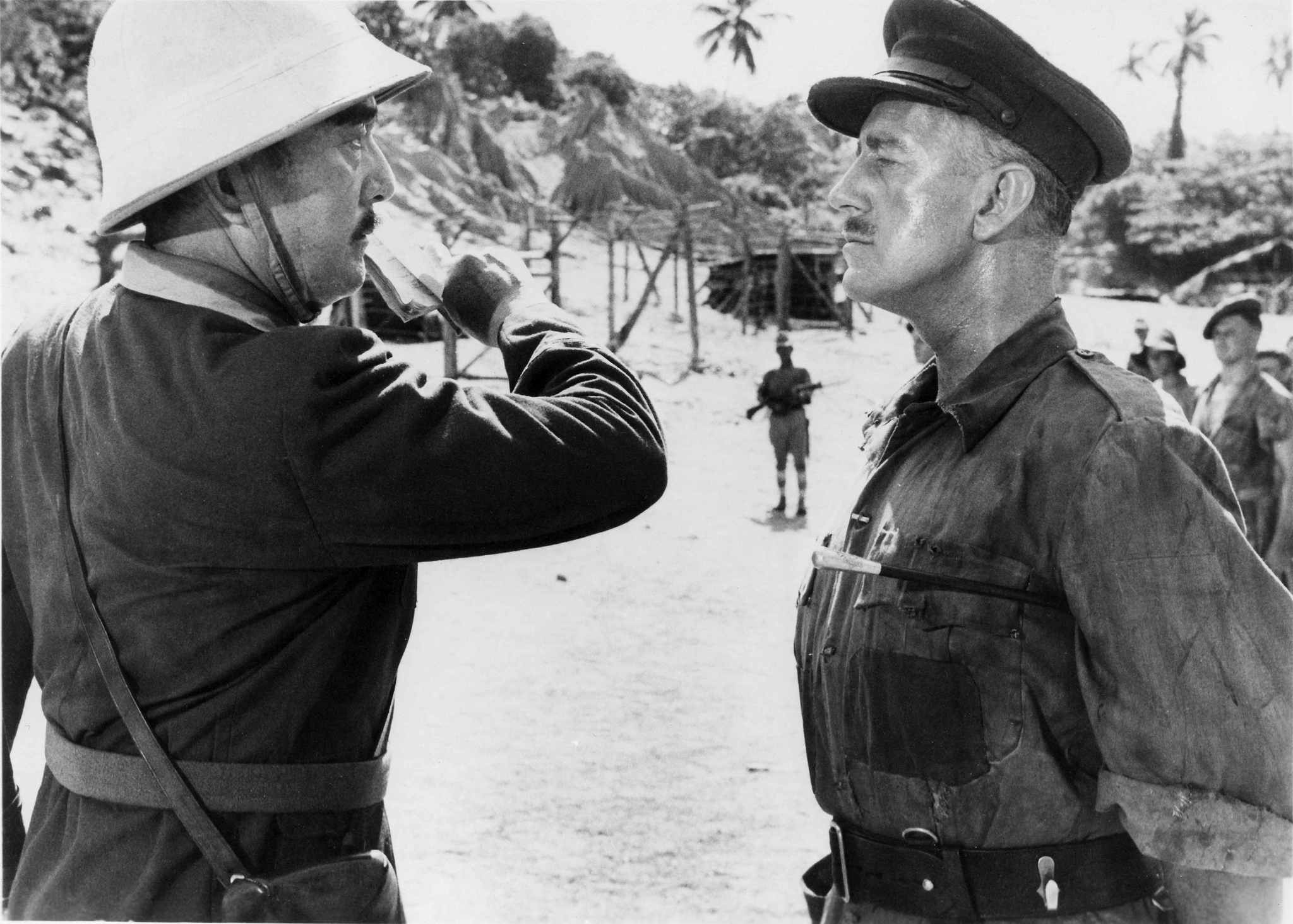 Still of Alec Guinness and Sessue Hayakawa in The Bridge on the River Kwai (1957)