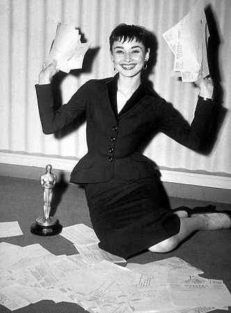33-2259 Audrey Hepburn receiveing telegram congratulations after winning an Oscar for 