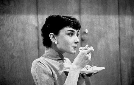 33-2332 Audrey Hepburn takes a quick lunch break during her first publicity shoot at Paramount