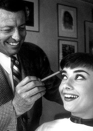 33-2334 Audrey Hepburn with Wally Westmore as he prepares her for her first publicity shoot at Paramount
