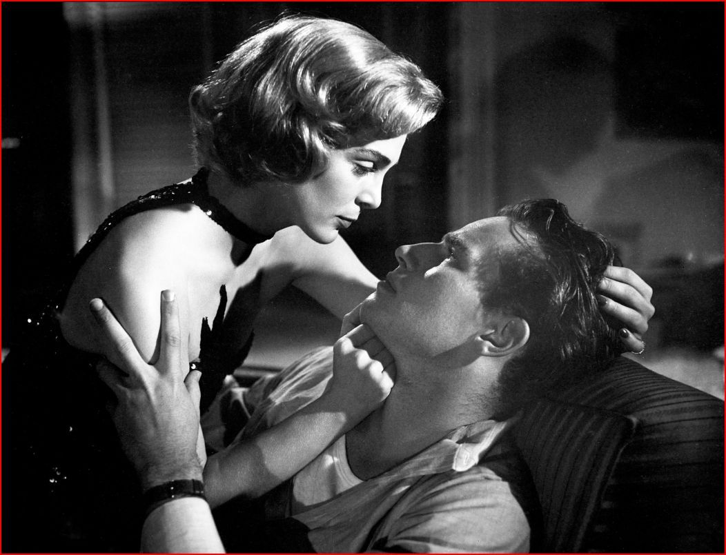 Still of Charlton Heston and Lizabeth Scott in Dark City (1950)