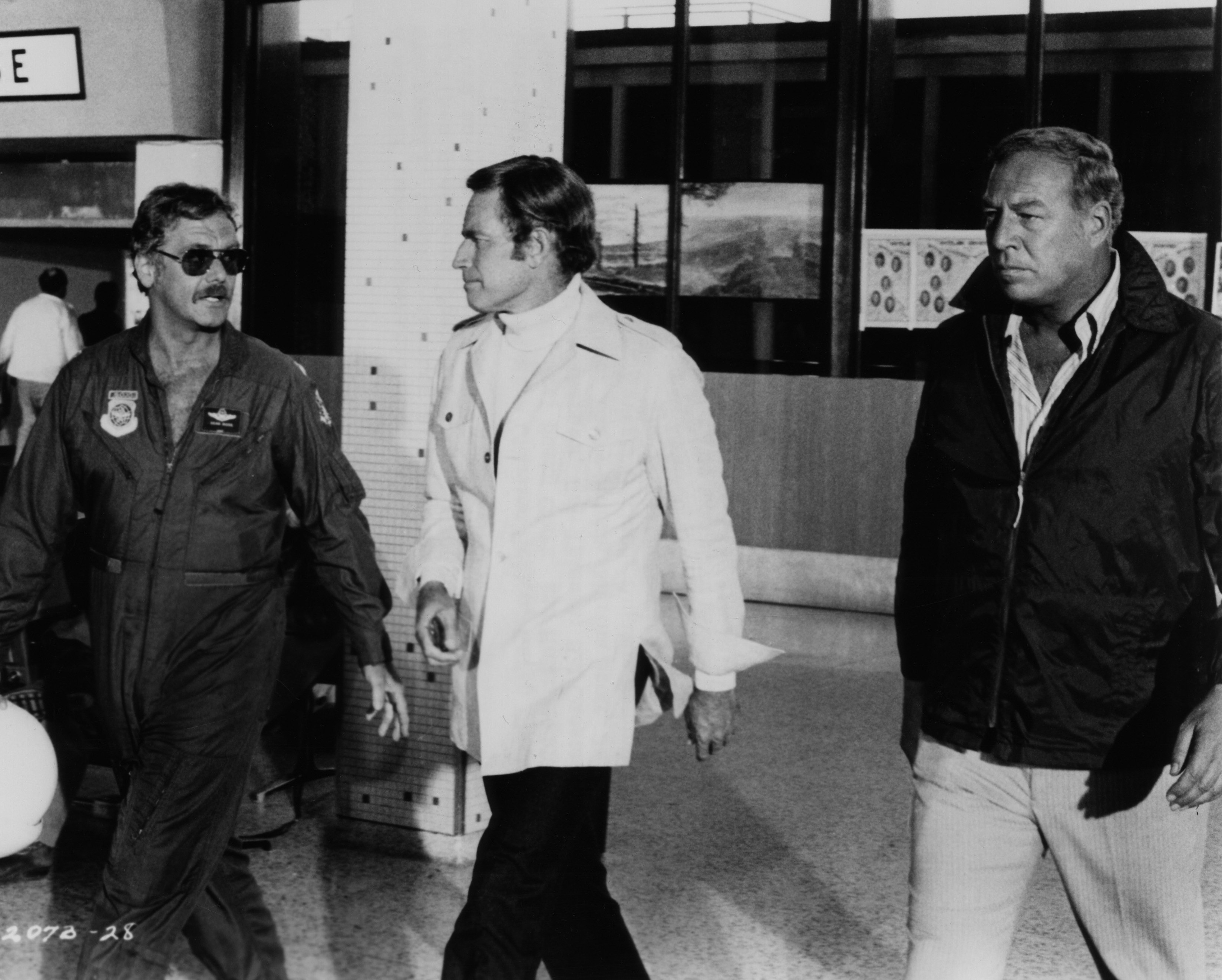 Still of Charlton Heston, George Kennedy and Guy Stockwell in Airport 1975 (1974)