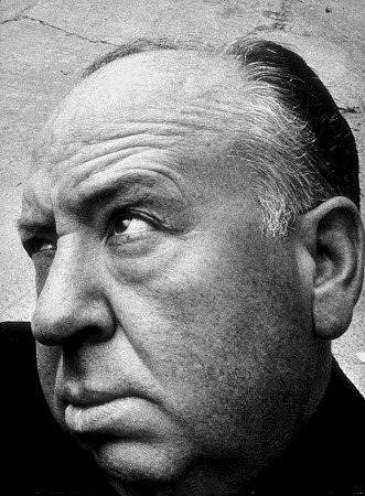 Alfred Hitchcock self-portrait with Bill Avery's camera on set, 