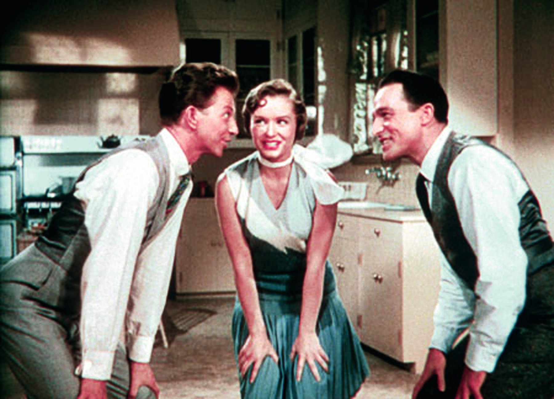 Still of Gene Kelly, Debbie Reynolds and Donald O'Connor in Singin' in the Rain (1952)