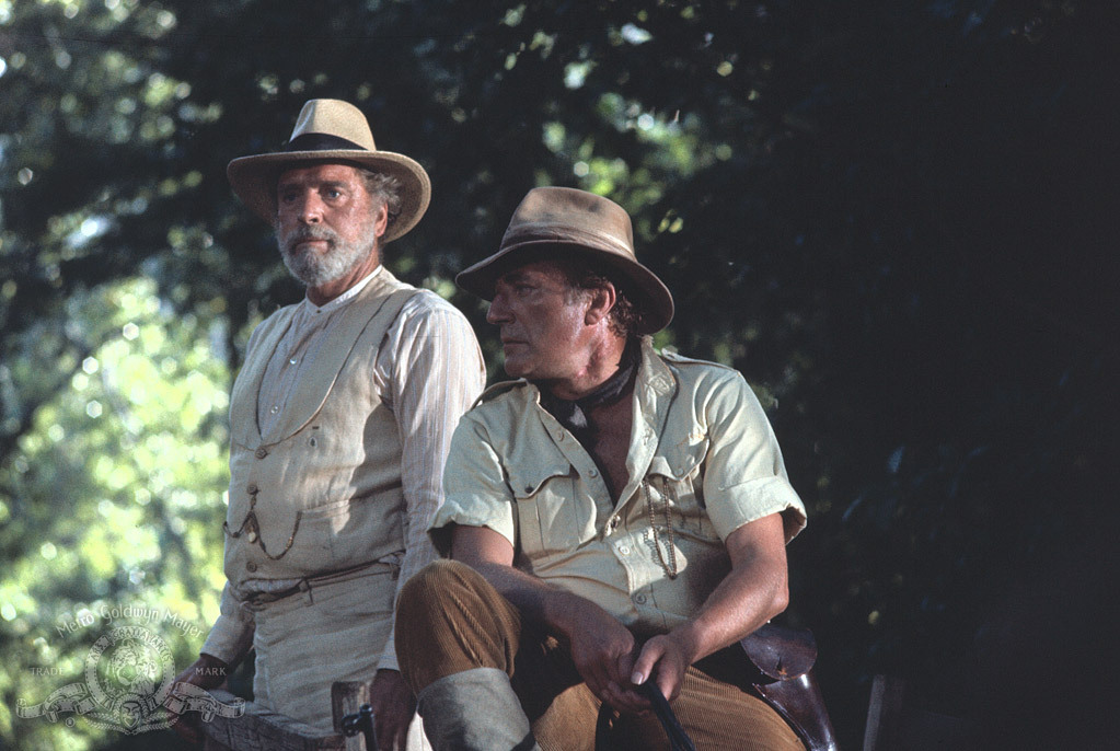 Still of Burt Lancaster and Nigel Davenport in The Island of Dr. Moreau (1977)