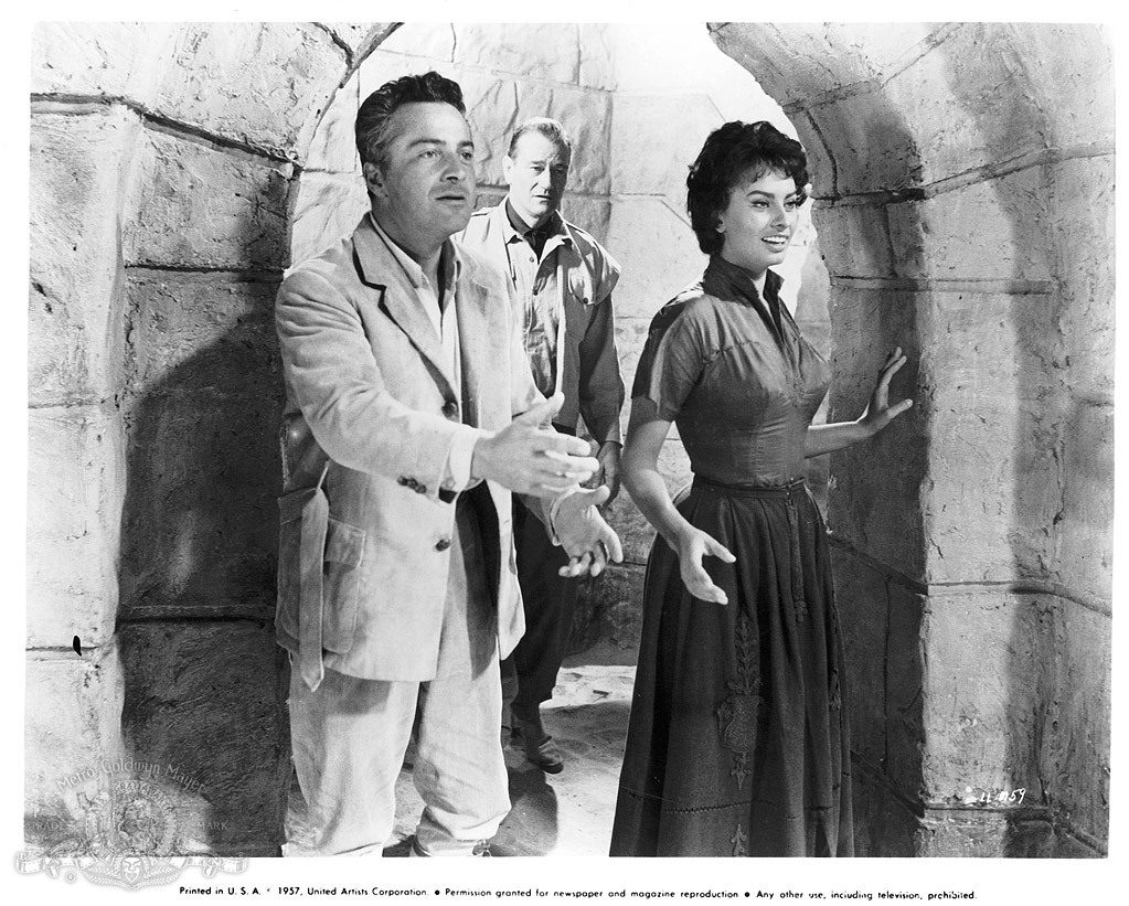 Still of Sophia Loren, John Wayne and Rossano Brazzi in Legend of the Lost (1957)