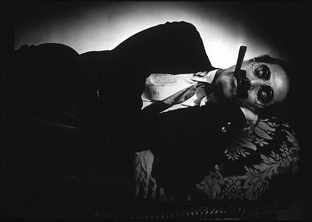 Groucho Marx lying down on a couch for 
