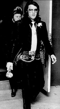 Elvis Presley arriving in Memphis, Tennessee, for the wedding of Chief Security Officer, Delbert 