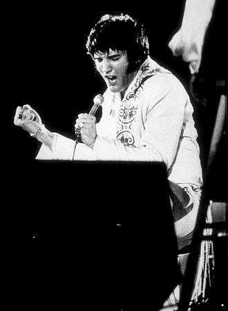 Elvis Presley performing at the Houston Astrodome in Houston, Texas, 2/28/70.