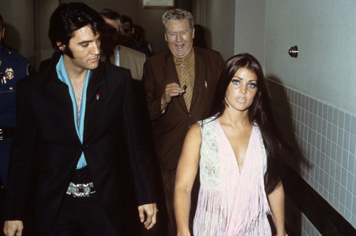 Elvis Presley with Priscilla and father Vernon circa 1970s
