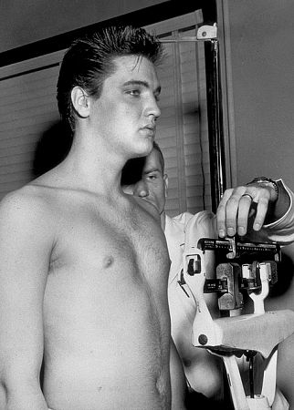 Elvis Presley weighing in during his induction into the army, 1958.