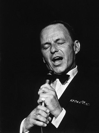 Frank Sinatra performing, 1964. Modern silver gelatin, 14x11, stamped. $600 © 1978 David Sutton MPTV