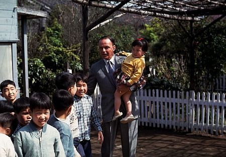 Frank Sinatra visits Japanese orphans during his children's charities tour 1962 © 1978 Ted Allan