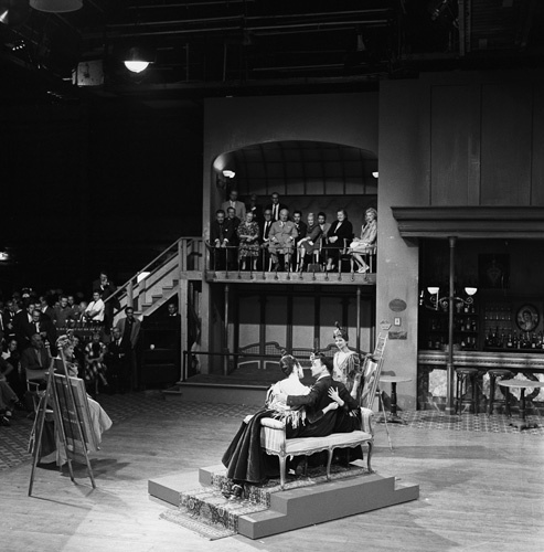 Nikita Khrushchev watches on as Frank Sinatra performs on the set of the film 