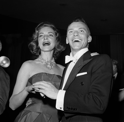 Frank Sinatra and Lauren Bacall making a personal appearance for a fundraising event 07-02-1955