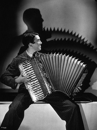 James Stewart playing the accordian, 1936. Modern silver gelatin, 14x11, estate stamped. $600 © 1978 Ted Allan MPTV