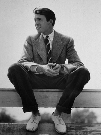 James Stewart sitting on a wooden fence with a camera, 1936. Modern silver gelatin, 14x11, estate stamped. $600 © 1978 Ted Allan MPTV