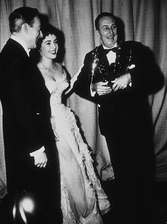 Elizabeth Taylor, second husband Michael Wilding and Walt Disney at the Academy Awards