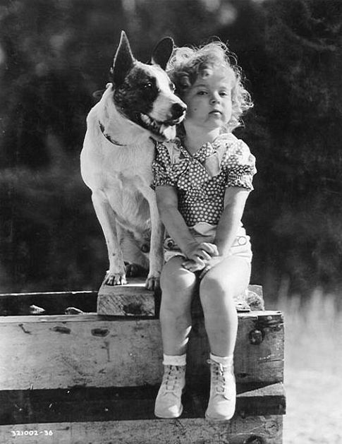 Shirley Temple and friend on the set of 