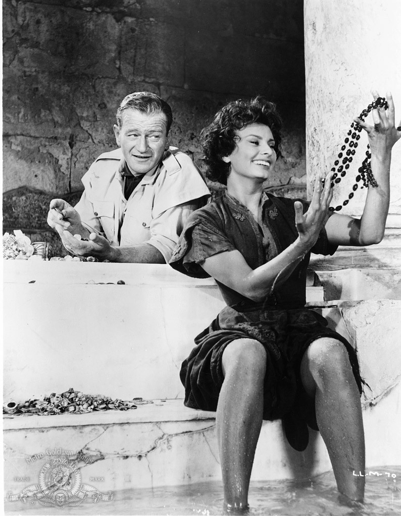 Still of Sophia Loren and John Wayne in Legend of the Lost (1957)