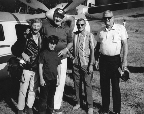 John Wayne with son Ethan and photographer David Sutton circa 1970s