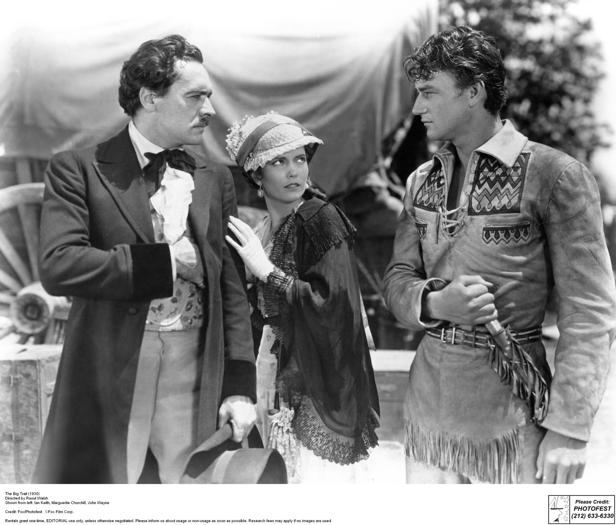 Still of John Wayne, Marguerite Churchill and Raoul Walsh in The Big Trail (1930)
