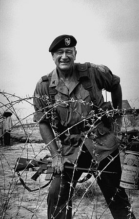 John Wayne behind barbed wire for 