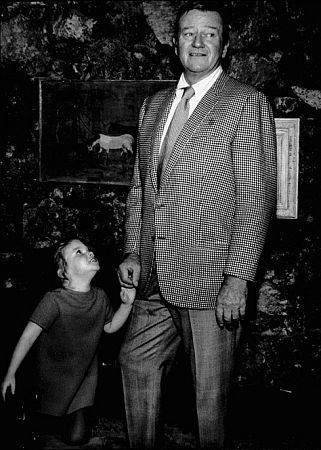 John Wayne and his daughter, Marissa, at home, 1970.