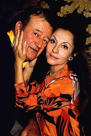 John Wayne and his wife, Pilar, at home, 1970.