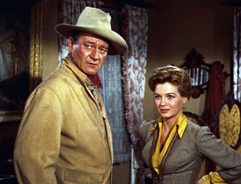 Still of John Wayne and Angie Dickinson in Rio Bravo (1959)