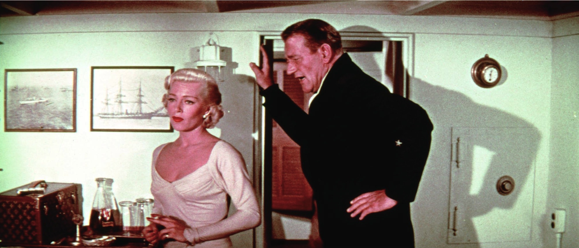 Still of John Wayne and Lana Turner in The Sea Chase (1955)