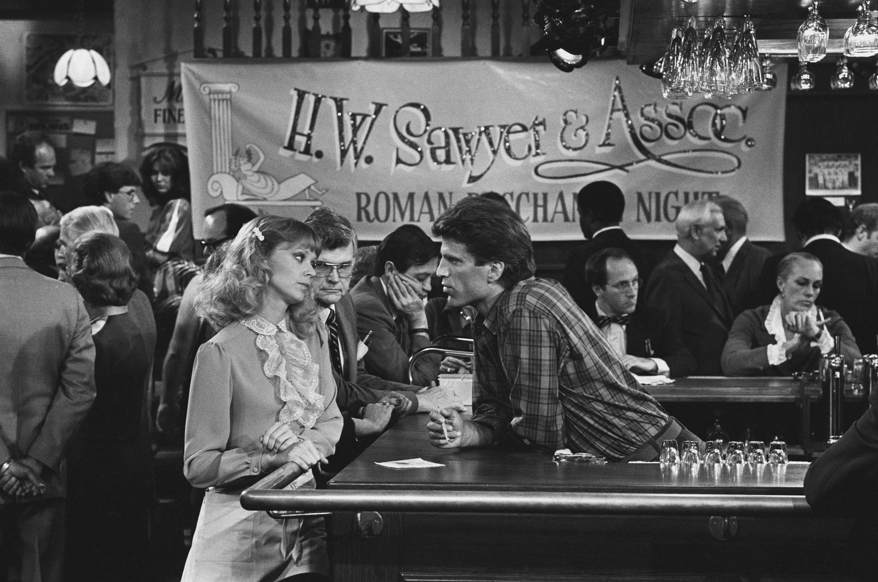 Still of John Cleese, Ted Danson and Shelley Long in Cheers (1982)