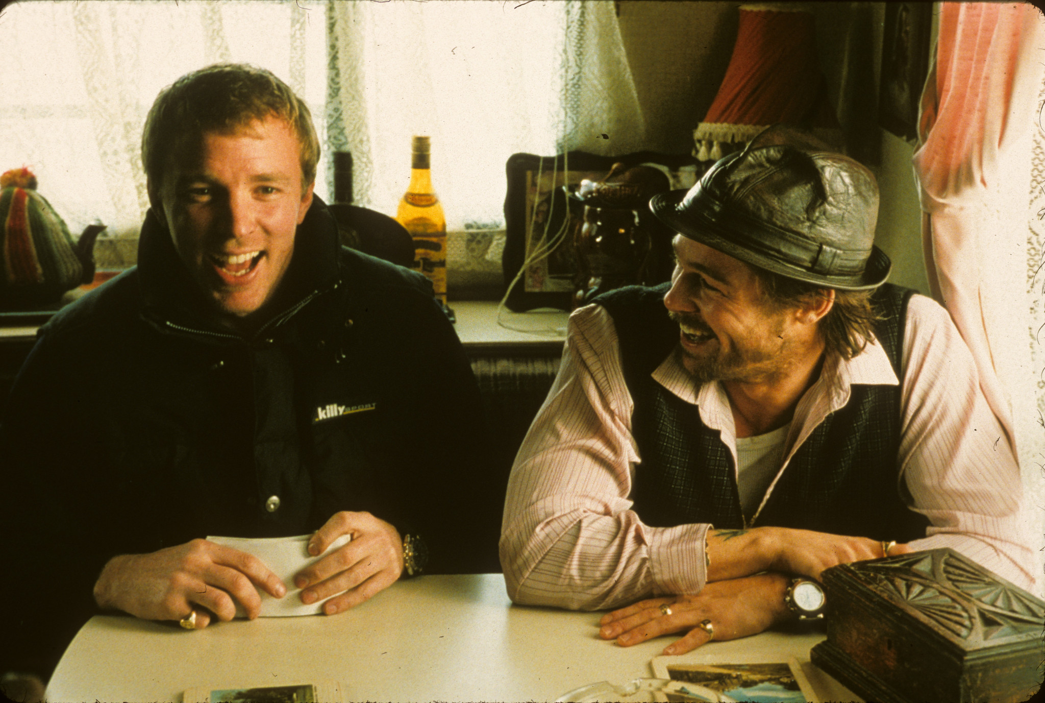 Brad Pitt and Guy Ritchie in Snatch. (2000)